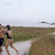 Illustration for article titled Amateur MMA Fighter Beats Up Man Jerking Off In Front Of Her During Beach Photoshoot